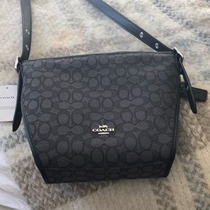 Coach cross body bag. New with tags.